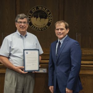 Wheaton Mayor Philip J. Suess Signs Proclamation for WDI’s 90th Year