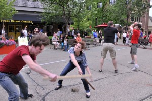 Dan Stromquist and Katheryn Pucillo demonstrate a section of the Montague/Capulet fight from "Romeo & Juliet" outside Playhouse 111 at the Taste of Wheaton.